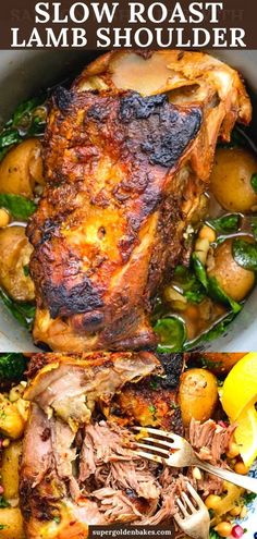 slow roast lamb shoulder with potatoes, spinach and lemons in a white bowl