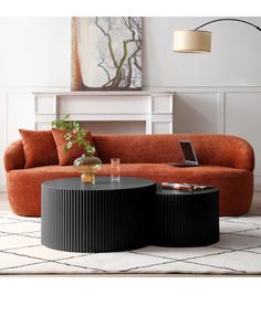 a living room with an orange couch and coffee table