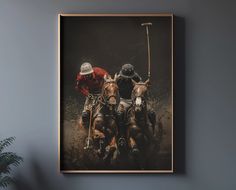 two men on horses are playing polo together