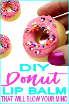 a hand holding a pink doughnut with sprinkles on it and the words diy donut lip balm that will blow your mind