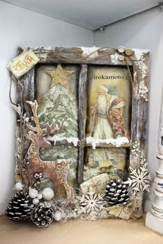 an old window is decorated with christmas decorations