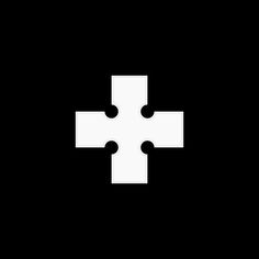 a white cross on a black background with four smaller ones in the center and one missing