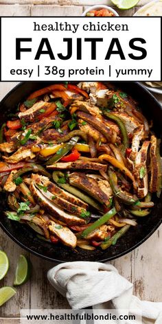 healthy chicken fajitas in a skillet with limes and cilantro