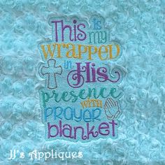 this is an applique on a blanket that says, this is wrapped in his presence with peace and prayer