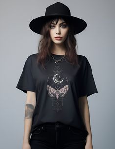 Get 10% off your first order: join.lucidamystica.com Mystical dusty pink moth and moon phase over occult symbols on a super-soft unisex tshirt in Vintage Black. Will become your next wardrobe staple as it feels super-soft and worn in. Comes in plus sizes for a roomy fit.  Perfect for yourself or as a gift for your favorite witchy human! Size up for an oversized aesthetic fit, size chart found in images. Printed on a soft Bella Canvas 3001 tshirt in Vintage Black.  + Retail fit + 100% Soft cotton Aesthetic Plus Size, Pink Moth, Plus Size Goth, Oversized Aesthetic, Occult Symbols, Goth Clothing, Edgy Aesthetic, Aesthetic Fits, Grunge Look