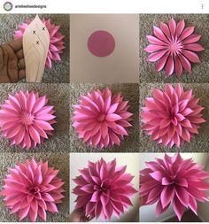 pink paper flowers are arranged on the floor