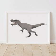 an image of a t - shirt with a dinosaur on it's back in a white frame