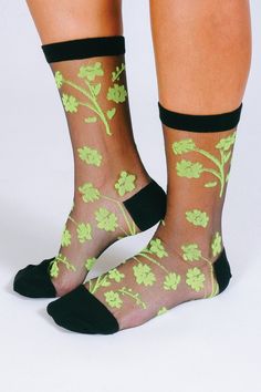 The Petal sheer ankle features a bold neon floral design perfect for adding a pop of color. A lightweight ankle-length sock with a reinforced toe and heel. SizeOne Size Fits Most, W 7-10 Design+ 200 Needle+ Ankle+ Reinforced toe & heel+ Seamless toe+ Premium Japanese Nylon Content + Care+ Premium Combed Cotton+ Wash Cold/Dry Low+ Imported Trendy Multicolor Socks For Spring, Sheer Socks For Party In Summer, Sheer Socks For Summer Parties, Spring Black Mesh Socks, Black Mesh Socks For Spring, Trendy Green Socks For Spring, Black Ankle-high Socks For Spring, Black Mid-calf Socks For Spring, Black Spring Party Socks