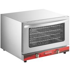 an oven with the door open and red trimmings on it's sides