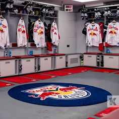 the red bull locker room is clean and ready to be used as a dressing area