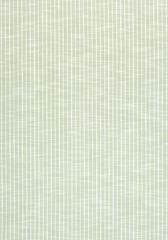 a green and white wallpaper with small squares on the top right half of it