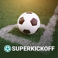 a soccer ball sitting on top of a green field with the words super kick off