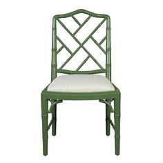 a green chair with a white cushion on it's seat and backrests