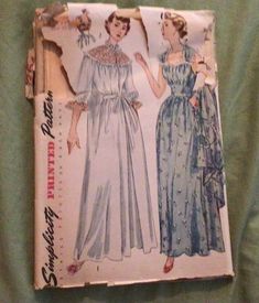 an old fashion book with two women in dresses on the front and one woman's dress