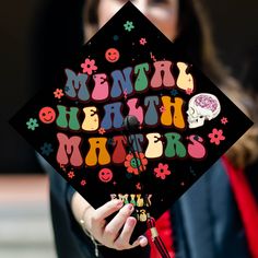 a woman in a graduation cap that says mental health matters