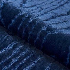 an up close shot of a blue velvet fabric