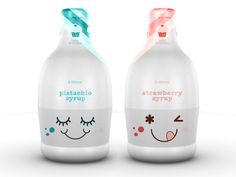 two bottles that are sitting side by side on a white surface, one with eyes closed and the other has a smiley face drawn on it