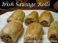 four sausage rolls on a white plate with the words, irish sausage rolls cooking tip of the day