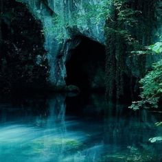 there is a cave in the middle of the water and it looks like something from another world