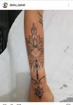 a person with a tattoo on their arm