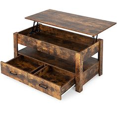 an old wooden coffee table with drawers