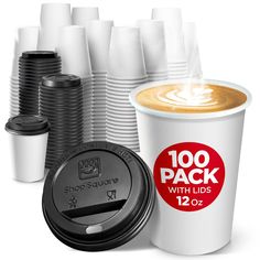 there are many cups with lids next to each other and one has a hot drink in it