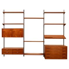 three shelving units with drawers and shelves on each side, one is made out of wood