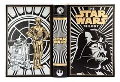 the star wars book is opened to show an image of darth vader and c - 3po