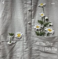 there is a shirt with flowers in the pocket