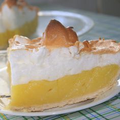 a slice of lemon meringue pie on a plate