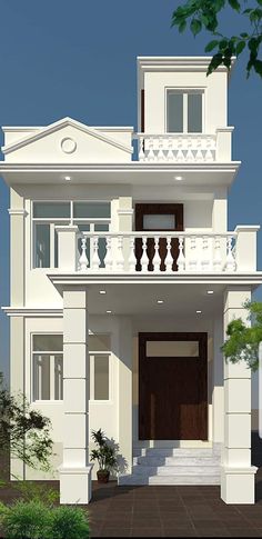 a white two story house with balcony and balconies