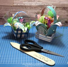 scissors are sitting next to an easter basket