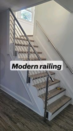 the stairs in this house have been painted white and are being used as a stair railing