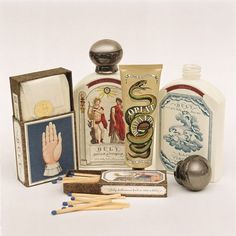 an assortment of old fashioned items including soap, matches and toothpaste on a white background