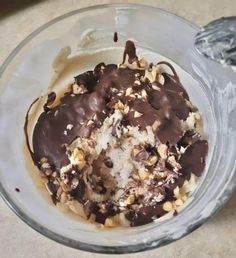 a bowl filled with ice cream and chocolate