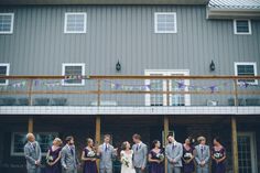 a group of people standing in front of a building