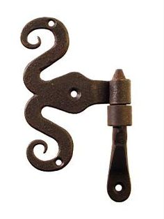 an iron hook with the letter s on it