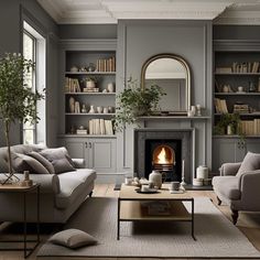 a living room filled with furniture and a fire place in the middle of a room