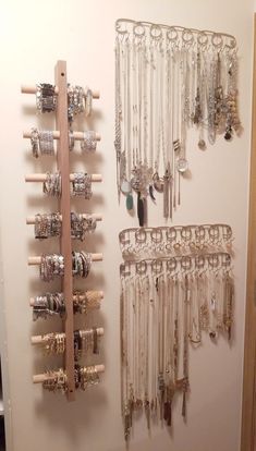 a wall mounted jewelry rack next to a door