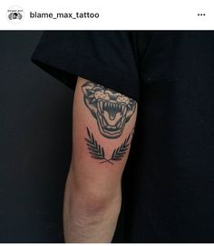 a person with a tattoo on their arm