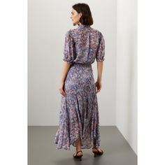 Blue floral cotton (100% Viscose). A-line. Short sleeves. Tie neck. Pull on. 53" from shoulder to hemline. Imported. Spring Printed Flowy Dress, Spring Printed Dress With Flowy Skirt, Floral Print A-line Maxi Dress With Flowy Skirt, Floral Print A-line Flowy Maxi Dress, Flowy A-line Maxi Dress With Floral Print, Spring Floral Print Fit And Flare Dress, Fall Floral Print Dress With Flowy Skirt, Elegant Ditsy Floral Print Dress For Casual Wear, Elegant Floral Dress With Ditsy Print