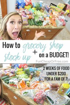 a woman standing in front of a counter full of food and holding her mouth open