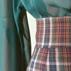 "ALEBERTINE MULTICOLORED TARTAN SKIRT a sheath dress Warning! We will prepare your chosen item immediately but we do not guarantee our usual super fast delivery. Items will be shipped no earlier than April 20th. If you order this item you agree to wait a variable time for delivery. The world situation is constantly changing due to the global epidemic. With your choice you support a small Italian artisan company. Thanks a lot. ALEBERTINE skirt. This item is handmade in tartan fabric. Wonderful Italian fabric. Soft but consistent hand. Suitable for the autumn winter season. The skirt is made in pencil model, with pleats both front and back. Equipped with a 5 cm high bustier, calculated with a high waist. The skirt has an opening on the back with a matching zip. Finished internally, with matc Elegant Fitted Plaid Skirt, Elegant Plaid Skirt For Work, Chic Fitted Plaid Skirt, Green Pencil Skirt For Workwear In Fall, Fitted Green Pencil Skirt For Fall, Elegant Green Pencil Skirt For Party, Elegant Green Mini Pencil Skirt, Elegant Plaid Knee-length Skirt, Fitted Plaid Skirt For Party