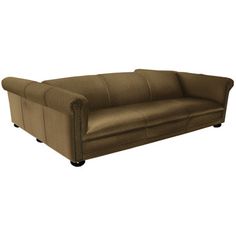 a brown couch with studding on the armrests and back rests against a white background