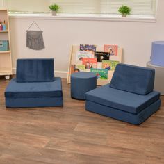 two blue chairs and a chair in a child's room