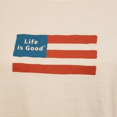 a t - shirt with the words life is good on it and an american flag