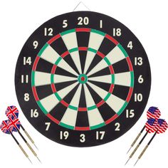 an american flag dart and two british flags on top of a dart board with darts