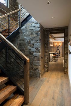 a wooden floor and stairs in a house