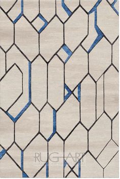 an area rug with blue and white geometric designs on it's edges, in the shape of hexagons