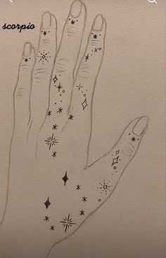 a drawing of a hand with stars on it and the words scorpion written in black ink